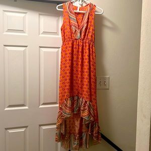 NWOT never worn. Small snag can barely see photoed. Comes with attached slip.